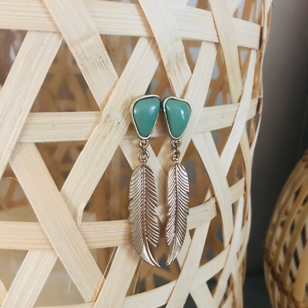 Gold feather drop earrings